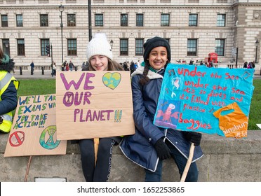 London, UK. 14th February 2020. Student Activists With Placards At The Youth Strike 4 Climate Demonstration Rally At Parliament Square, In Protest Of The Government's Lack Of Action On Climate Change.