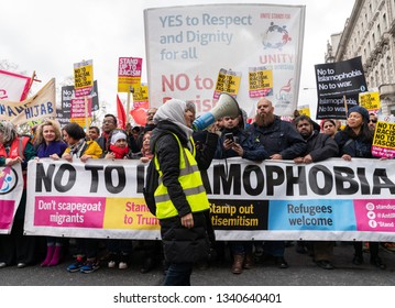 London, UK. 16th Feb, 2019. A Muslim woman protester shouts 'No To Islamophobia' during Anti-Racism demonstration in London. 