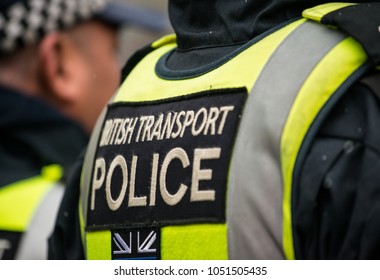 London, UK. 17th March 2018. EDITORIAL - Close Up Of Sign On The Back Of A London Police Officer's Reflective Stab Vest, Reading BRITISH TRANSPORT POLICE.