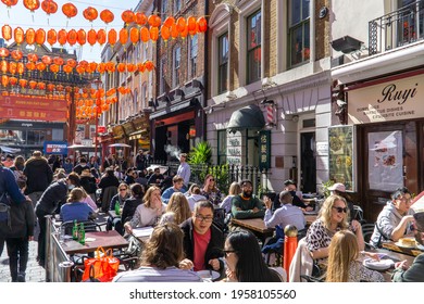 London, UK - 18 April 2021: Outdoor Drinking And Dining Outside Restaurants In Chinatown, Soho, Central London 