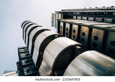 London, UK - 18 April 2022: The ultra modern Lloyds of London Building, in the financial district of the City of London. Founded in 1686, building is the corporate headquarters.