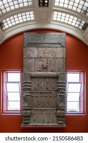 London, UK - 18th April 2022: Cast of a Persian Palace doorway in the British Museum, London. The door depicts King Xerxes of the Achaemenid royal family and figures in costime from the Persian Empire