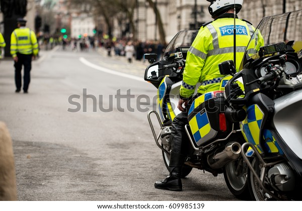 London, UK. 18th March 2017. EDITORIAL - Police\
presence and escort at the March Against Racism rally - National\
demo for UN Anti-Racism Day. Police patrolled the route of the\
march through London.