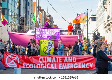 London, UK, 19th April 2019. Climate change/eco protesters at the Extinction Rebellion demonstration, at Oxford Circus, London, in protest of world climate breakdown and ecological collapse.