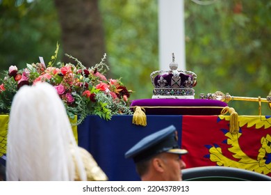 London, UK - 19th Sep 2022: The Imperial State Crown, Sceptre And Wreath Of Symbolic Flowers Adorn The Coffin Of Her Late Majesty The Queen Elizabeth II On The Gun Carriage For The Funeral Procession