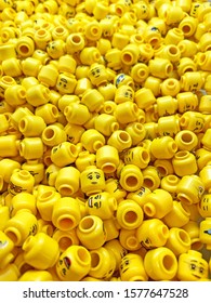 London, UK - 1st December 2019: Lots Of Yellow Lego Heads And Faces In A Lego Store. Lego Is A Danish Contruction Toy Invented In 1932. It Is Now One Of The Most Popular Toys Worldwide. 