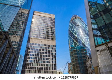 London, UK - 2 February, 2020 - Low angle view of tall corporate buildings in financial district