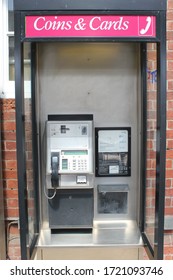 London, UK- 20/04/2020: Telephone Booth Payphone BT Payphone Open Booth