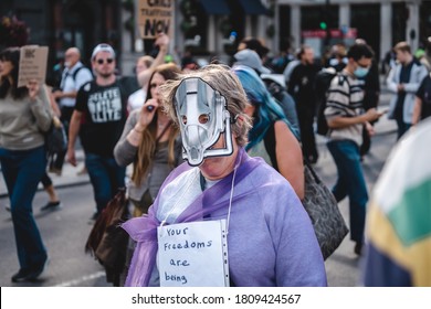 London / UK - 2020.09.05: Old Lady Wearing Mask At Save Our Children Protest Against Children Trafficking.