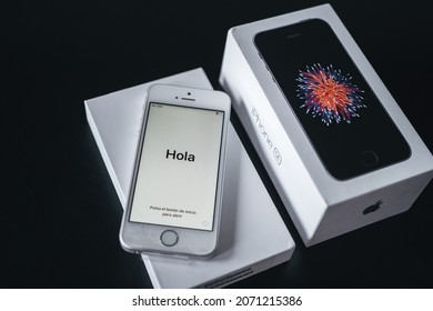 London | UK - 2021.10.09: Close Up Product Photos Of Iphone SE In Silver Color Sealed In Plastic On Box