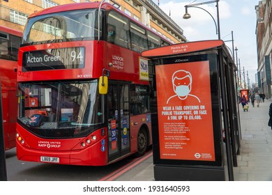 London, UK - 21 February 2021: Bus Shelter With Coronavirus Health Warning, Oxford Street, Westminster, London