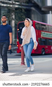 London, UK - 21 June, 2022: Young Woman  Walking  In The City Of London. Street Photography