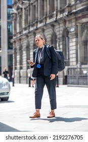 London, UK - 21 June, 2022: Woman Is Walking  In The City Of London. Street Photography