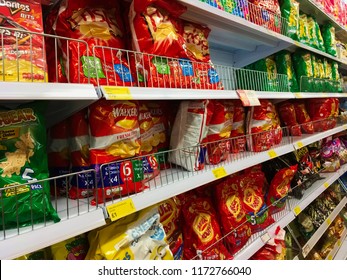 London, UK - 22 August 2018: Walkers And Lays Crisps On A Shelf In A Supermarket.