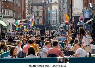 London, UK - 22 August 2021: Outdoor Dining, People Eating And Drinking On Old Compton Street, Soho