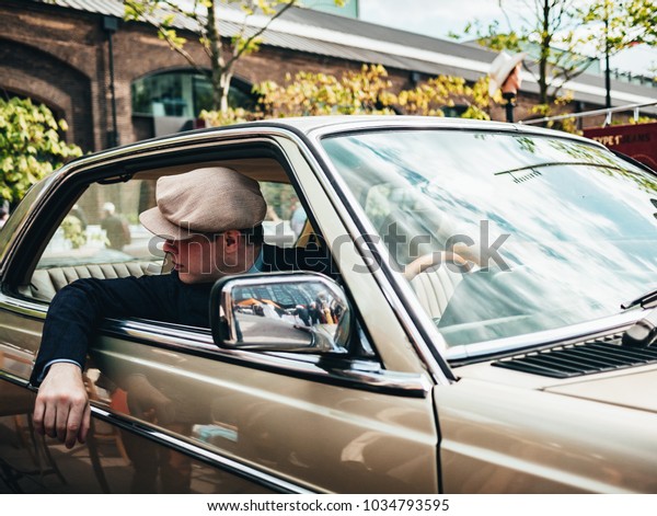 London / UK - 22.04.2017 :\
Guy In Vintage Mercedes Looking Through The Window. Classic Car\
Boot Sale