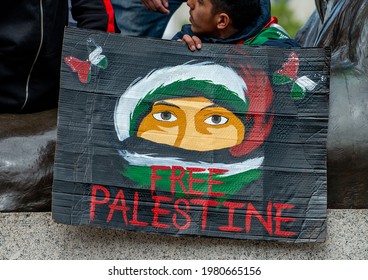 London, UK. 22nd May 2021. Pro-Palestine Protest Sign At The London Protest Demonstration On Victoria Embankment, Urging The UK Government To Take Action To Stop Allowing Israel To Act With Impunity.