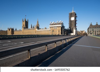 LONDON, UK - 23 MARCH 2020: Empty city centre in London, Westminster Bridge and Houses of Parliament during COVID-19, lockdown during coronavirus