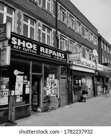 LONDON/ UK- 23rd July 2020: Old Shoe Repair Shop On, East London High Street, Taken In Black And White.