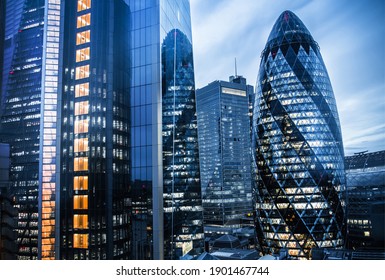 London, UK - 26 April, 2020: City Of London At Night With Lots Of Office  Buildings Lights. 