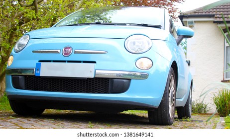 London UK 26th April 2019 Fiat 500 Blue Car Parked On Driveway 