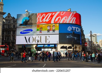 LONDON, UK - 26TH SEPTEMBER 2014: Part of Piccadilly Circus during the day showing large amounts of people outside