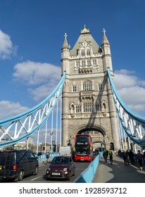 London, UK - 27 February 2021: Red London Bus On Tower Bridge, London