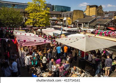 LONDON, UK - 27TH MAY 2013: A View Of Food Stalls At Camden Market During The Day. Lots Of People Can Be Seen.