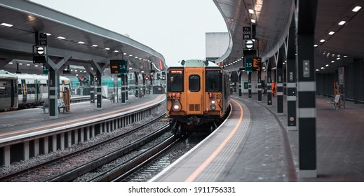 London, UK - 3 February, 2021: Train Arriving To London Bridge Station, No People Empty Platform. Generally Busiest Station Of The City Of London Now Empty Due To Covid Lockdown 