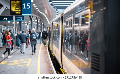 London, UK - 3 February, 2021: People Getting Out Of The Train At London Bridge Platform, London At Lockdown Time Due To Covid 