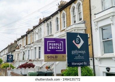 London, UK - 31 May 2021: Multiple For Sale Signs In A South London Street.