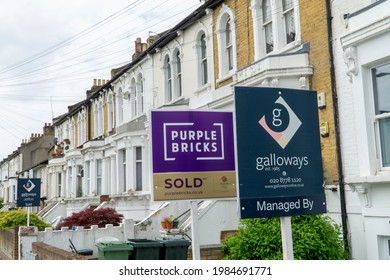 London, UK - 31 May 2021: Multiple For Sale Signs In A South London Street.