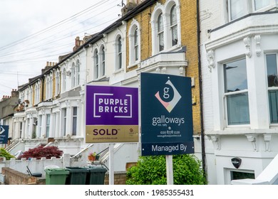 London, UK - 31 May 2021: Multiple For Sale Signs In A South London Street.