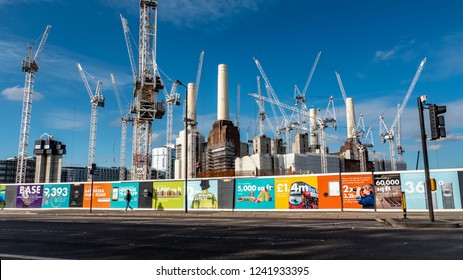 LONDON, UK - 31 OCTOBER 2018: Battersea Power Station, London. Hoarding Illustrating The Benefits Of Gentrification Following Local Residential And Business Redevelopment.