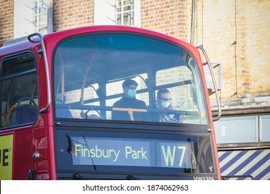 London, UK - 4 November, 2020 - Passengers With Face Masks On A Double-decker Bus