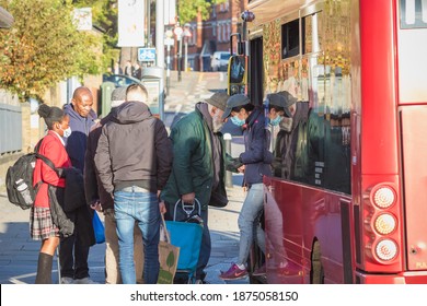 London, UK - 4 November, 2020 - Passengers Getting On And Off The Double Decker Bus While Some Wearing Face Masks In Crouch End