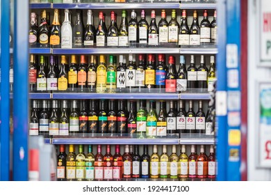 London, UK - 5 February, 2021 - A selection of wines displayed on shelf in an off-licence shop (liquor store) in Turnpike Lane