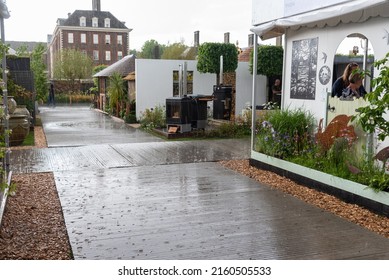 London, UK - 5,24,2022: Heavy Rain At The Chelsea Flower Show