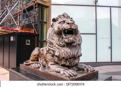 London, UK - 6 December 2020: HSBC Lion Sculptures In Canary Wharf