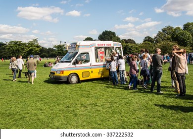 London, UK - 6 September 2015: People Queuing In Front Of An Ice-cream Van In The Royal Park Of Battersea, London, UK