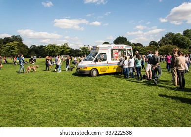 London, UK - 6 September 2015: People Queuing In Front Of An Ice-cream Van In The Royal Park Of Battersea, London, UK