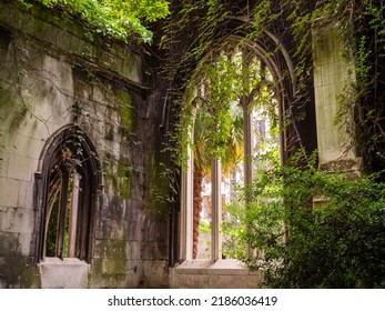 London, UK – 7 30 2022:  Climbing plants, shrubs and trees, reclaim the ruined former City of London church of St Dunstan-in-the-East, largely destroyed in the 1941 wartime Blitz, now a public garden.