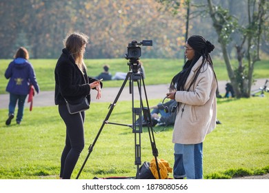 London, UK - 7 November, 2020 - Female Film Making Students Shooting Video In Alexandra Park