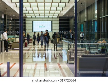 LONDON, UK - 7 SEPTEMBER, 2015: Office Building Entrance In Night Light. Canary Wharf Night Life