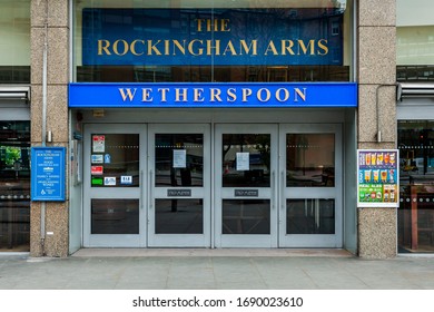 LONDON, UK - APRIL 1, 2020: A Wetherspoon Pub Stands Empty And Closed Amid The Coronavirus Outbreak