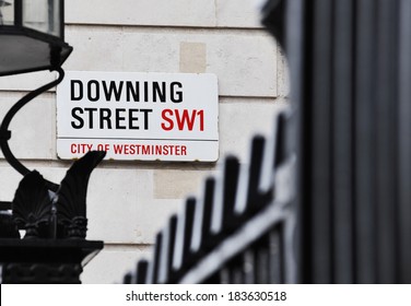 LONDON, UK - APRIL 10, 2009: Downing Street's sign in Westminster. Downing St. has housed government leaders for over three hundred years.