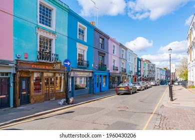 LONDON, UK - APRIL 11, 2021:Street view of Portobello Road in Notting Hill. This vibrant, trendy area is famed for its busy market selling antiques and vintage fashion and annual Notting Hill Carnival