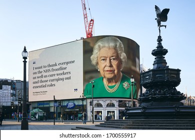 LONDON, UK - April 11th 2020: Queen Elizabeth II of England, Thank you NHS, COVID-19 corona virus pandemic, Stay Home, Save Lives, screen sign information panel message, Piccadilly circus, London