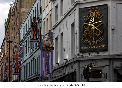 LONDON, UK - APRIL 13, 2022:  Sign For The Crown And Two Chairmen Pub On Dean Street, Soho