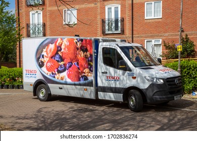 London / UK - April 13th 2020: Tesco delivery van vehicle parked outside a house delivering food during the coronavirus pandemic outbreak in London UK 2020